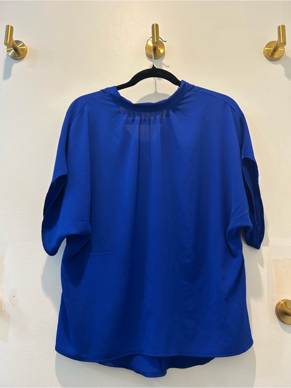 Women's Royal Blue Relaxed Short-Sleeve Top with bow at the back of the neck.